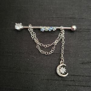 14 gauge stainless steel industrial ear piercing, beaded with crystal moon & sun